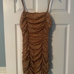 Ruched floral mini dress. spaghetti strap, cream and burnt orange